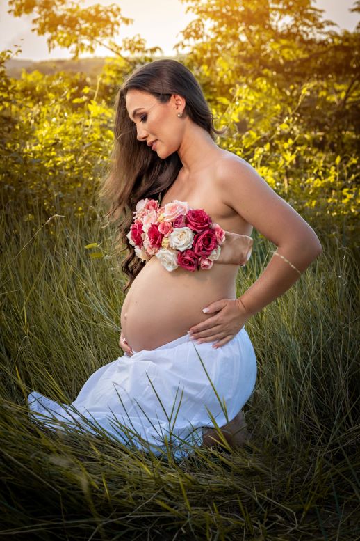 woman with bra made of flowers